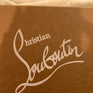 Christian Louboutin “Greggo” oxfords with red caps, size 41 (US 8).